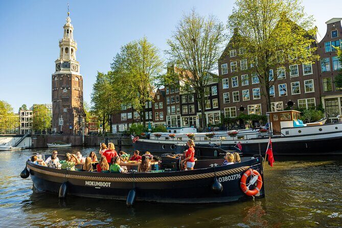 Amsterdam: Guided Open Boat Canal Cruise Including 1 Drink - The Sum Up