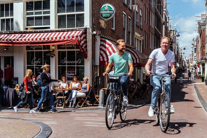 Amsterdam PRIVATE Bike Tour With Locals: Bike & Local Snack Included - FAQ