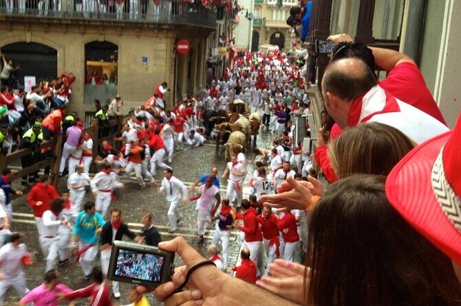Authentic San Fermín experience with balcony and buffet breakfast. - FAQ: Practical Questions About the Tour