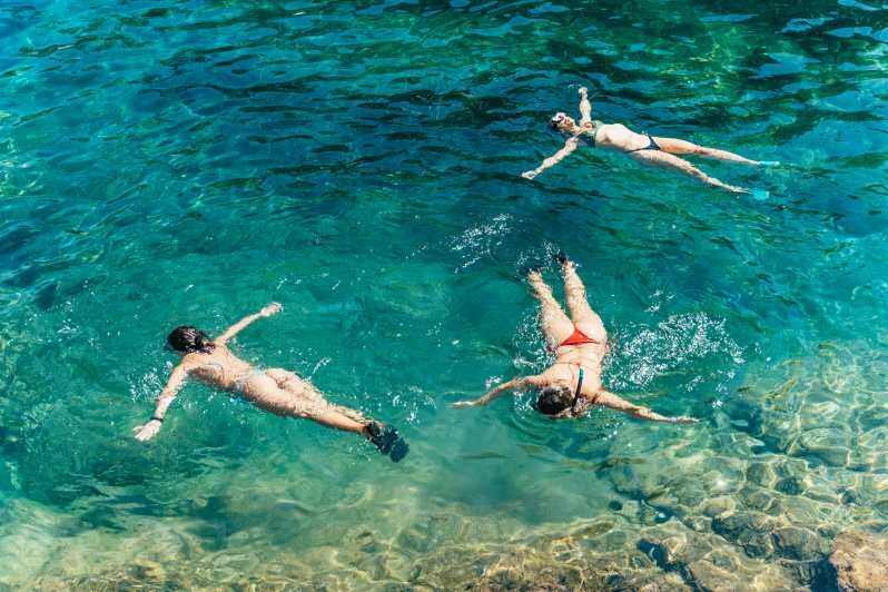 Barcelona: Tossa de Mar Kayak & Snorkel Tour w/3-Course Meal - Exploring the Coastline and Sea Caves