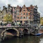 City walking experience in Amsterdam with a local - From Chinatown to Central Station
