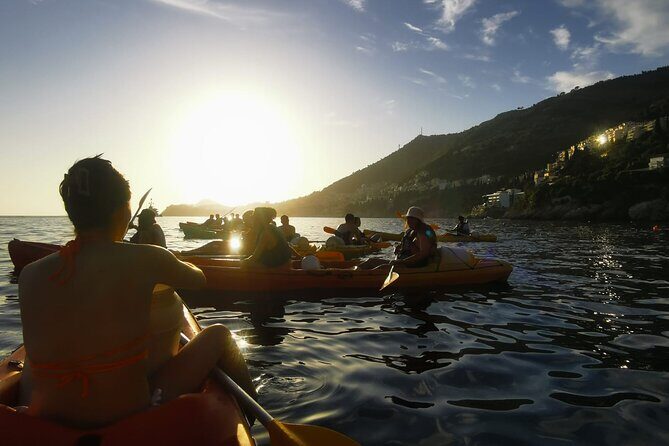 Dubrovnik: Sunset Kayak & Snorkel Tour with Wine & Water - Authentic Experiences and Authentic Guides