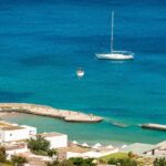 Elounda: Spinalonga Guided Boat Tour with BBQ and Swimming - Transportation, Timing, and Group Size