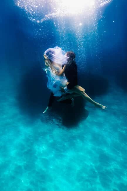 Exclusive underwater photo shoot in the sea near Palmain a turquoise blue bay - Is This Tour Worth the Price?