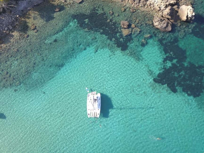 IBIZA: CATAMARAN CUEVAS CALA BASSA AND PLAYA CALA CONTE SUP PADDLE&SNORKEL - A Detailed Look at the Ibiza Catamaran Tour: A Balance of Relaxation and Adventure