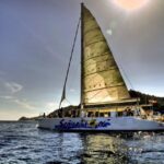 Lloret de Mar: Sunset Catamaran Cruise with DJ and Drinks - Who Should Consider This Experience?