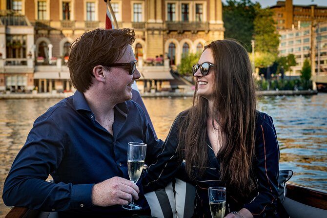 Private Boat Tour Amsterdam - 90 Min incl. welcome drink on historic saloon boat - Setting Sail on a Classic Amsterdam Canal Experience