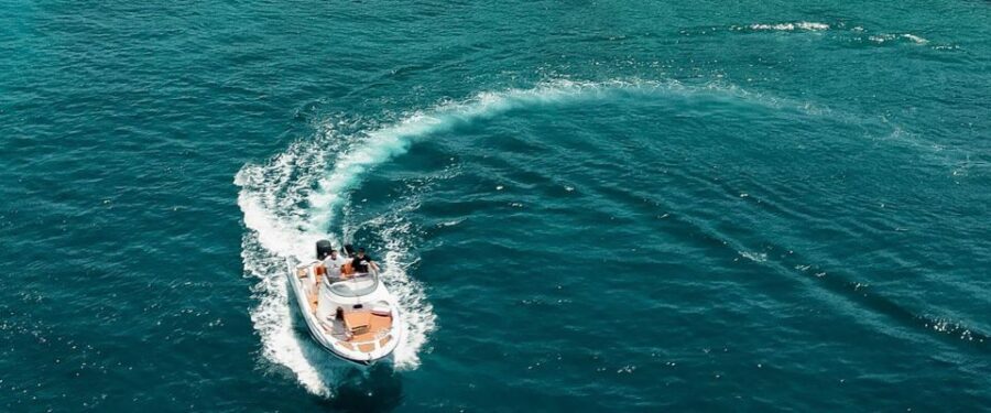 Private cruise to Kallithea & Anthony Quinn & Traganou Caves - The Sum Up