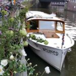 Private Guided Historic Amsterdam Canal Cruise in a Salon Boat - What Could Be a Drawback?