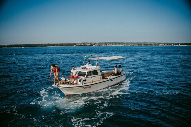 Pula: Boat Tour Dolphin and Sunset Watching - A Closer Look at the Experience