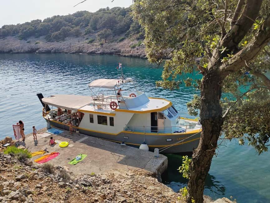 Punat-Krk, Cruise and swim at Golden Beach and Blue cave.