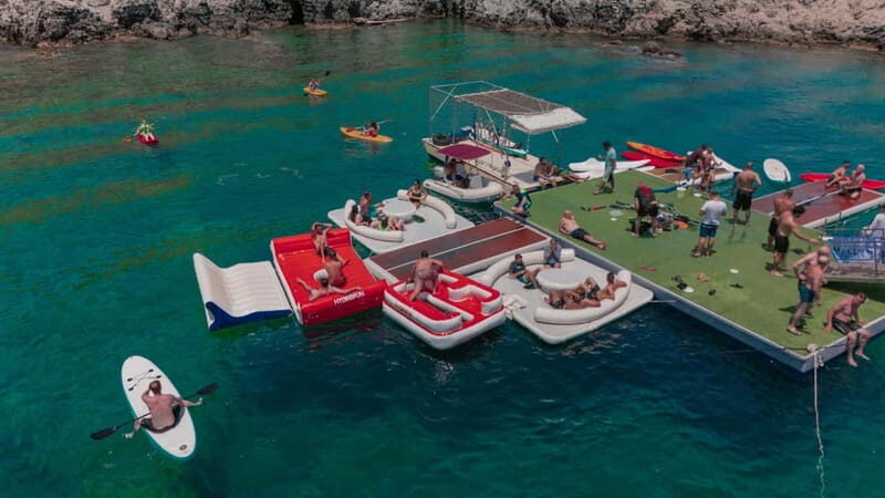Rhodes: Gulet Trip with Food, Drinks, SUP, Kayak & Swimming - The Sum Up