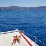 Santorini Cruise on Catamaran with BBQ & Open Bar - Summary of the Experience