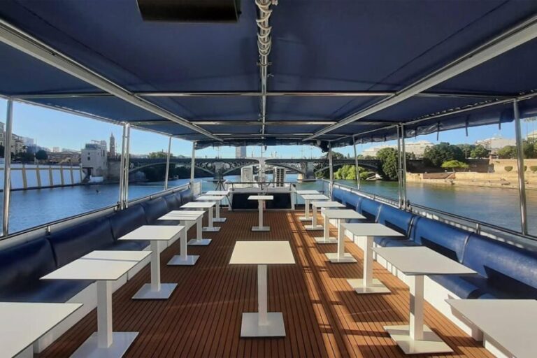 Seville: Restaurant boat ride on the Guadalquivir River with lunch/dinner - A Detailed Look at the Experience