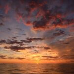 Sunset on sailboat in Cabo de Gata - The Sum Up