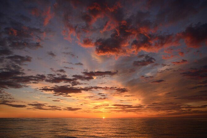 Sunset on sailboat in Cabo de Gata - The Sum Up