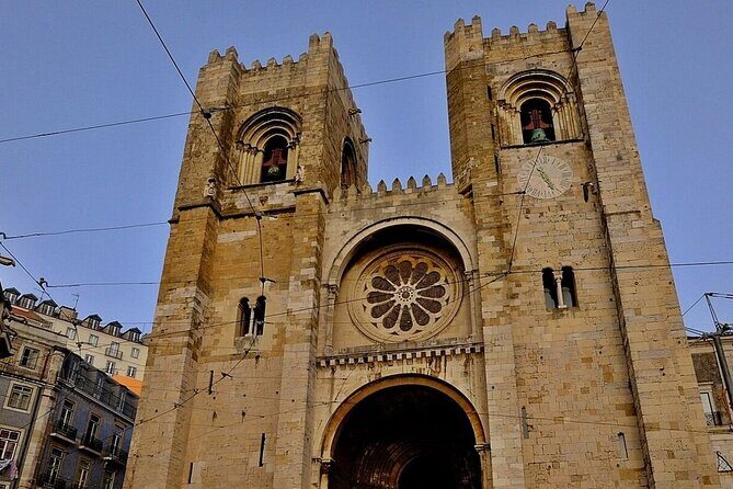 Tuk tuk experience through the historic neighborhood of Alfama - The Sum Up