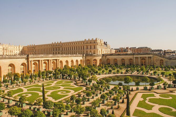 Versailles Palace and Trianon Guided Day Tour from Paris - Exploring the Gardens and Fountain Shows