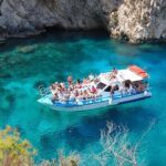 Zakynthos boat tour:Shipwreck& Local blue caves with 3 Swim Stops - FAQs