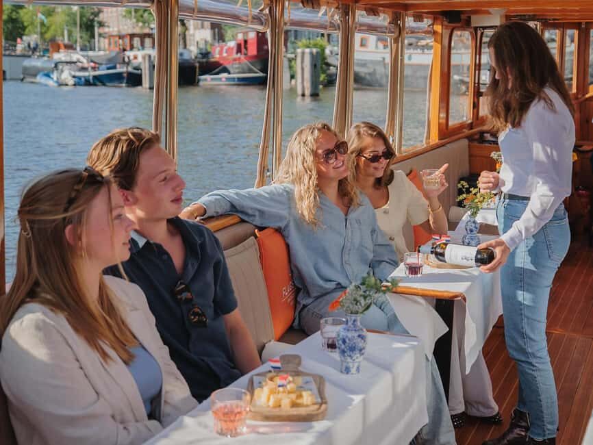 Amsterdam: Classic Boat Cruise with Optional Cheese & Wine - Exploring the Itinerary and Highlights