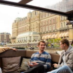 Amsterdam: Covered Canal Cruise with Drinks & Bites - Frequently Asked Questions