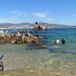 Arch Boat Tour and Snorkeling at Pelican Rock - Key Points