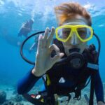 Baptism diving in the turquoise waters of Tahiti - The Virtues of Small Group, Guided Tours