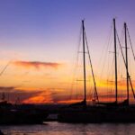 Boat tour of Ortigia at sunset with drinks included - Key Points