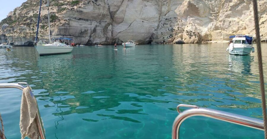 Cagliari gulf boat tour, sailing, snorkeling and drink.