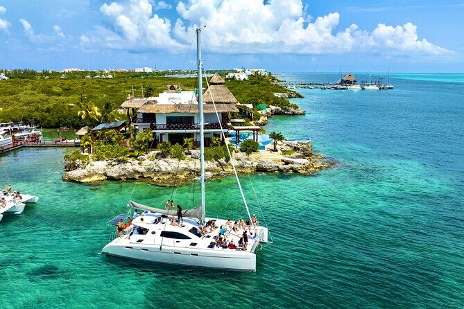 Cancun Catamaran: Isla Mujeres, Snorkeling, Drinks & Buffet Lunch - Buffet Lunch & Open Bar at the Beach Club