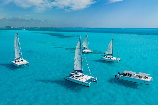 Cancún Catamaran to Isla Mujeres + Snorkel, Open Bar & Lunch - Authentic Experiences Based on Reviews