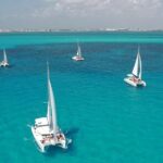 Catamaran to Mujeres Island with Open Bar on Board from Cancun - The Realities of the Experience