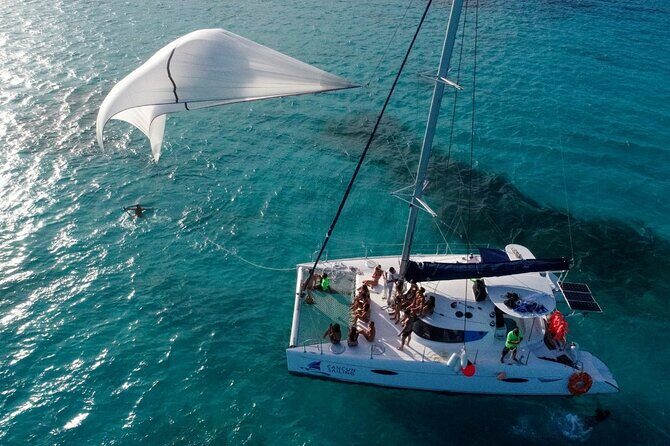 Catamaran Tour to Isla Mujeres, Open bar, Lunch, Snorkeling, Beach Club Included - FAQs