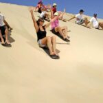 Doha: Beaches visit with Dune Bashing and SandBoarding - Sandboarding Near Sealine Beach