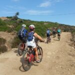 E-bike Excursion at Natural Park of Porto Conte - Punta Giglio - E-MTB Adventure - Discover the Hidden Gems of Sardinia’s Coast on Two Wheels