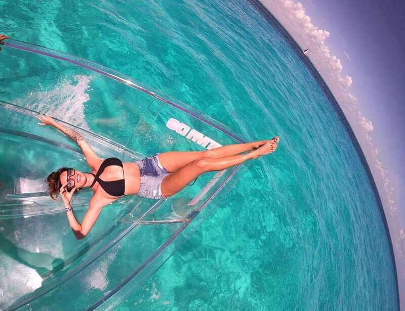 Explore the sea of cozumel in a transprent boat with drinks and snorkel. - Authentic Insights from Travelers