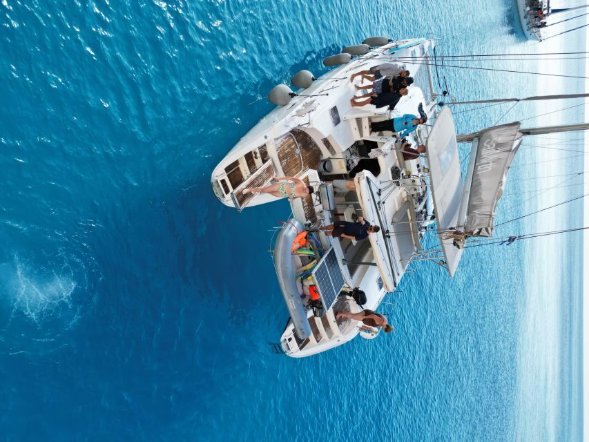 From Adamas: Milos and Poliegos Catamaran Cruise with Lunch - Setting Sail from Adamas