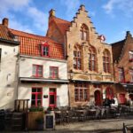 From Amsterdam: Day Trip to Bruges in Spanish - Authentic Experiences That Make a Difference