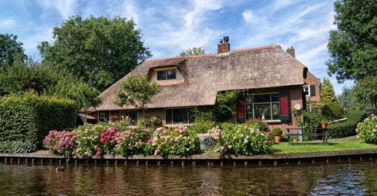 From Amsterdam: Private Tour to Giethoorn with Canal Cruise - Exploring the Charm of Giethoorn