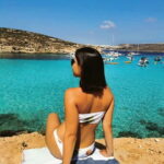 From Bugibba: Comino Blue Lagoon Return Trip (CMO) - The Blue Lagoon: A Crystal-clear Haven