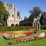 From Edinburgh: Alnwick Castle and Scottish Borders Tour - Starting Point & First Stops