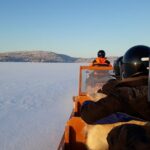 From Ivalo: Ice Fishing Safari to Lake Inari, reindeers & lunch - Snowmobile Sleigh Ride: Into the Heart of the Wilderness