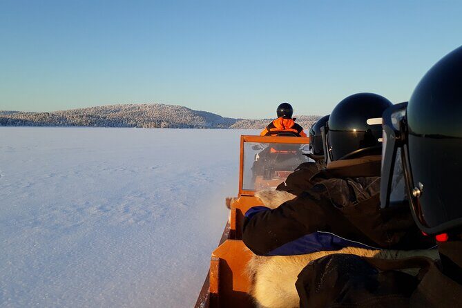 From Ivalo: Ice Fishing Safari to Lake Inari, reindeers & lunch - Snowmobile Sleigh Ride: Into the Heart of the Wilderness