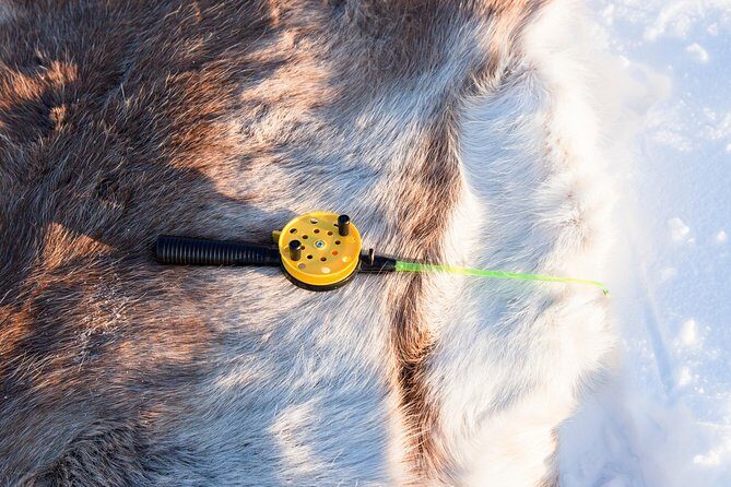 From Kakslauttanen: Ice Fishing Safari to Lake Inari, inc. lunch - A Deep Dive into the Ice Fishing Safari Experience