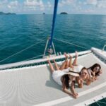 From Ornos: Mykonos Delos Catamaran Cruise with Meal & SUP - An In-Depth Look at the Mykonos Catamaran Experience