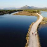 From the hills to Oasi Biderosa & Capo Comino with Electric Mountain Bikes - Whats Included and What to Consider