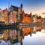Gdansk by night - walking tour - The Starting Point: Neptune’s Statue and Dlugi Targ Street