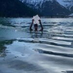 Get the cool Kick: Ice bathing in the mountain lake - The Benefits of Cold Water Therapy and Natures Role