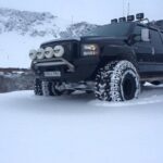 Golden Circle Super Jeep Adventure with Snowmobiling on Glacier - The Thrill of Snowmobiling on Langjökull Glacier