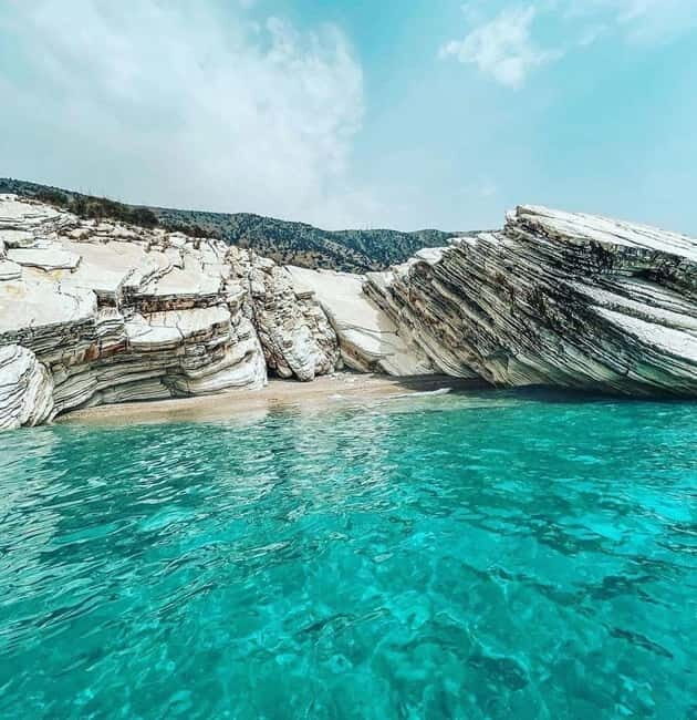 Group Tour From Saranda to Krorez Free Drink Umbrella - An Overview of the Saranda Boat Tour Experience